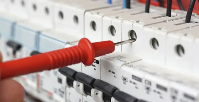 Electrical contractor testing circuit breakers during electrical repair in Sun Valley, NV