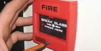fire alarm installation service showing manual fire alarm pull station installed by licensed electricians in Reno, NV