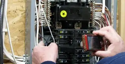 Home electrical inspection of circuit breaker panel by licensed electrician in Reno, NV