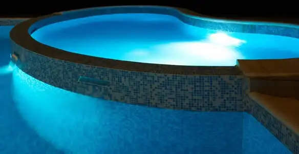pool light installation and repair services highlighting illuminated pool interior lighting in Reno, NV