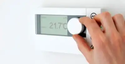 Thermostat installation service with professional adjusting temperature control in Reno, NV