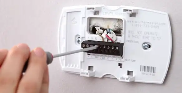 Thermostat installation service with proper wiring and secure wall mounting in Reno, NV