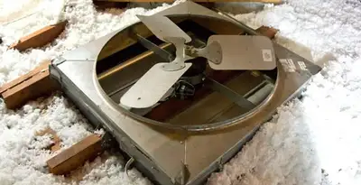 whole house fan installation services with attic-mounted ventilation unit in Reno, NV